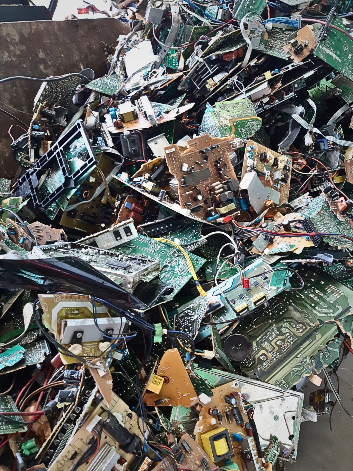 Photo of a pile of printed circuit boards (PCBs)