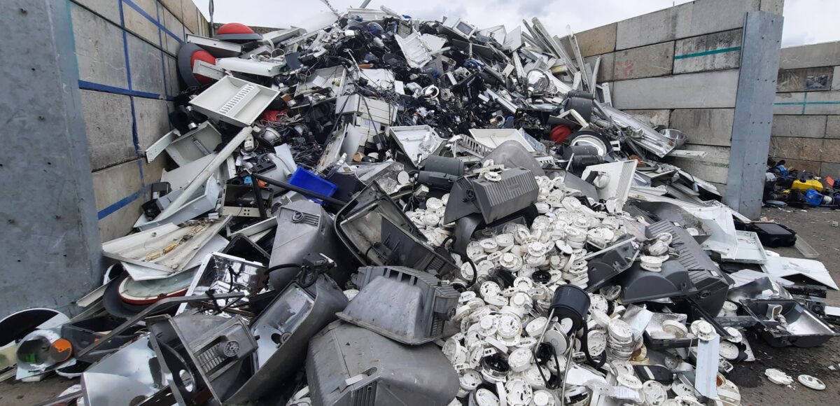 Photo showing a pile of Waste Electrical and Electronic Equipment (WEEE):
